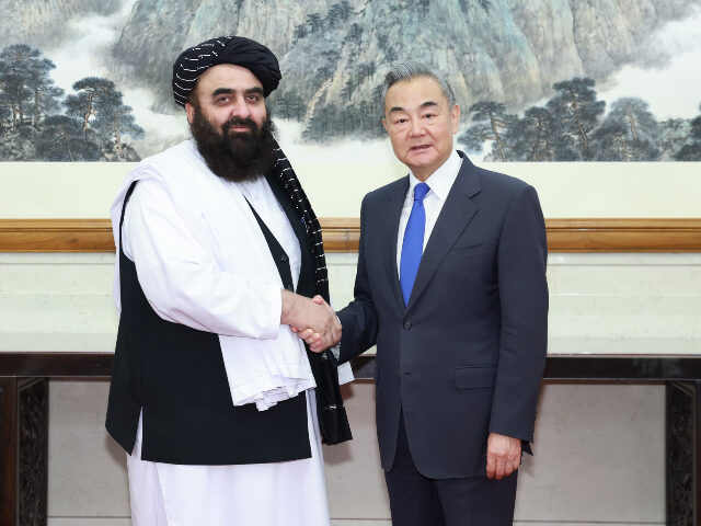Amir Khan Muttaqi and Wang Yi Chinese Foreign Minister Wang Yi, also a member of the Political Bureau of the Communist P