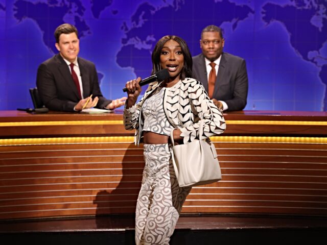 (AP) -- “Saturday Night Live” SATURDAY NIGHT LIVE -- Episode 1884 -- Pictured: (l-r) Anchor Colin Jost, Ego Nwodim as Mi