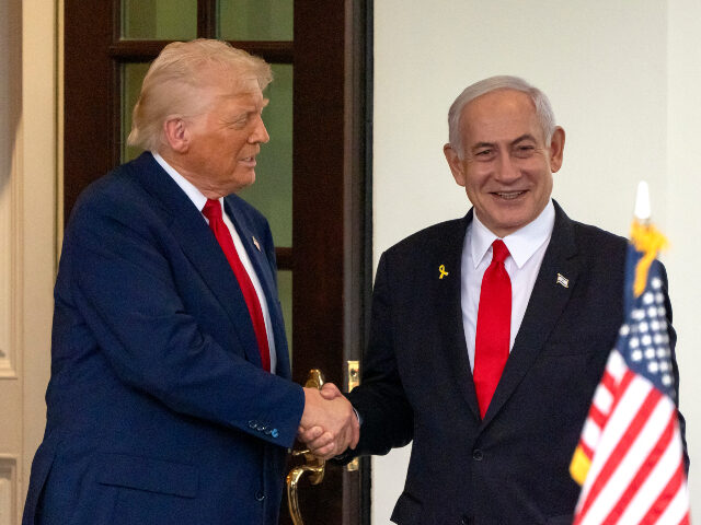 AP25097758647679 President Donald Trump, left, shakes hands with Israel's Prime Minister Benjamin Neta
