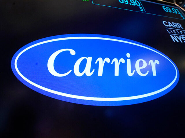 ap25121690819860-640x480-1 The logo for Carrier appears above a trading post on the floor of the New York Stock Excha