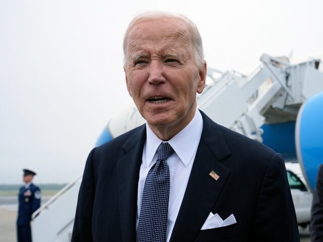 President Joe Biden speaks the the media after stepping off Air Force One at Dover Air For