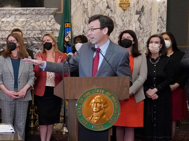Bob Ferguson Washington Attorney General Bob Ferguson, right, gestures towards Gov. Jay Inslee, left, d