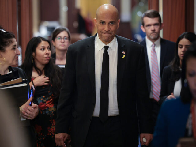 Corey Booker Filibuster U.S. Sen. Cory Booker (D-NJ) walks toward reporters after delivering a record setting floo