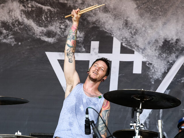 DanielWilliams VENTURA, CA - JUNE 22: Drummer Daniel Williams of The Devil Wears Prada performs during th