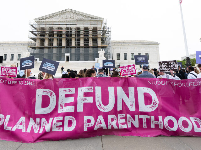 Defund Planned Parenthood Activists opposing funding for Planned Parenthood demonstrate in front of the U.S. Supreme