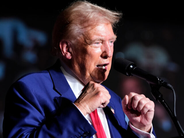 Donald Trump Republican presidential nominee former President Donald Trump gestures with his fists as h