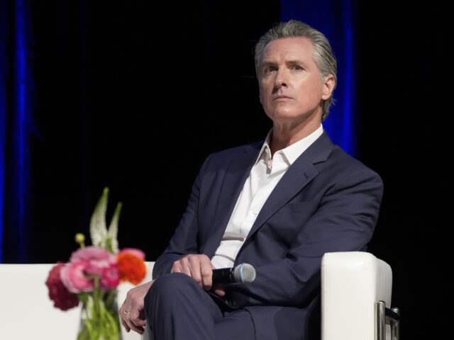Gavin Newsom (Damian Dovarganes / Associated Press) California Gov. Gavin Newsom holds a fireside chat with Stephen Cheung, the President and