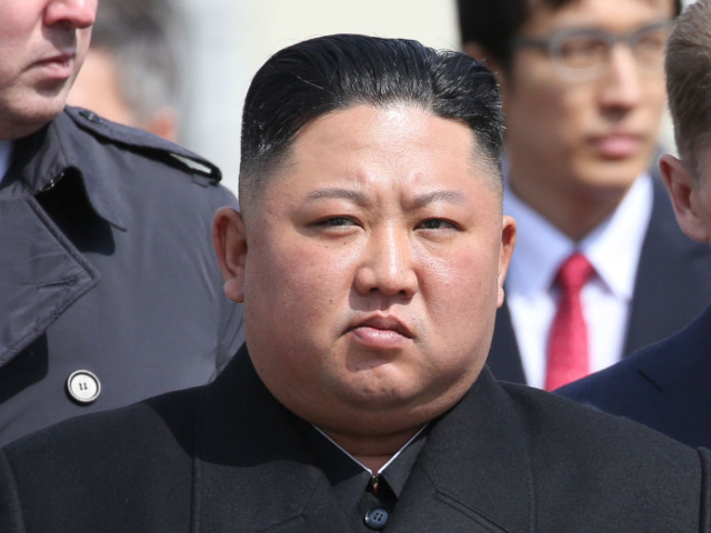 GettyImages-1139393493 Kim Jong Un, North Korea's leader, watches an honor guard before his departure to North Ko