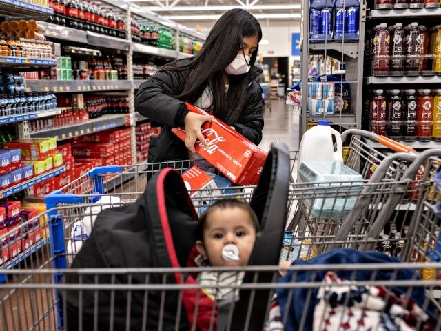 Unaccompanied Minor From Honduras Joins Extended Family In Indiana After 8 Weeks in US Govt Custody CLARKSVILLE, INDIANA - APRIL 24: Honduran immigrant Nani, 10, helps shop at Walmart a day