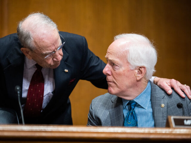 GettyImages-2076699989 UNITED STATES - MARCH 14: Sens. John Cornyn, R-Texas, right, and Chuck Grassley, R-Iowa, c