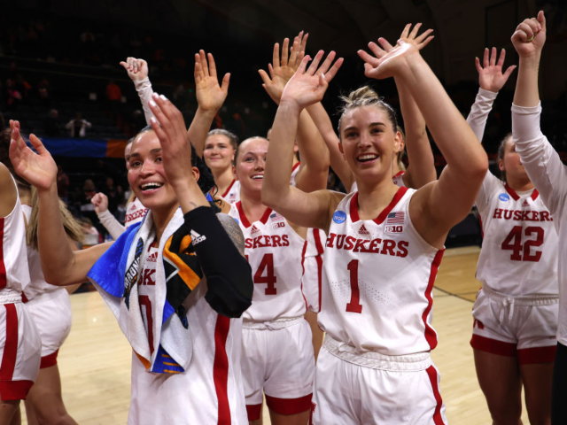 GettyImages-2097724106 CORVALLIS, OREGON - MARCH 22: The Nebraska Cornhuskers wave to fans during the first round