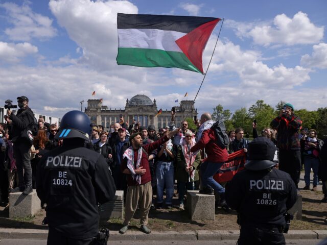 gettyimages-2150287945-1-640x480-1 BERLIN, GERMANY - APRIL 26: Police confront protesters, one of whom is waving a Palestinia