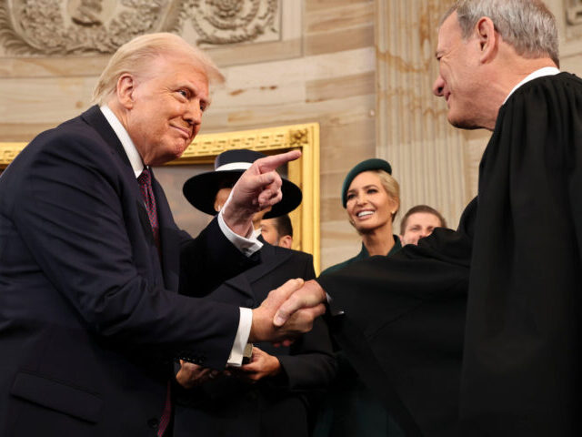 Inauguration Of Donald Trump As 47th President Of The United States US President Donald Trump and John Roberts, chief justice of the US Supreme Court, shake h