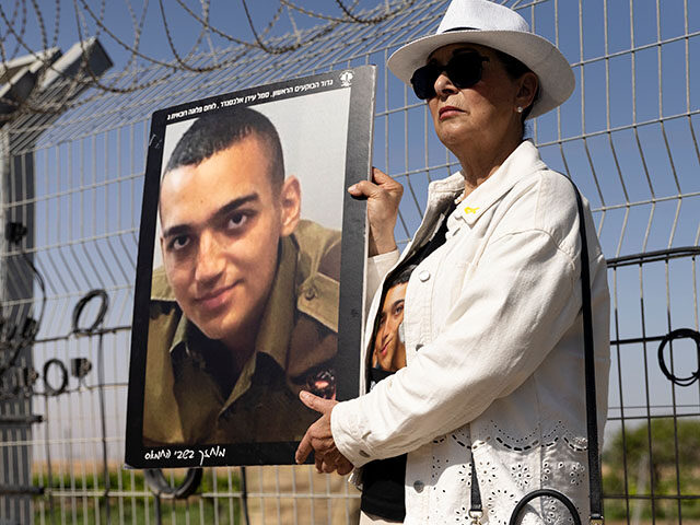 gettyimages-2210475136-640x480-1 Varda Ben Baruch holds a photo of her grandson Israeli- American hostage Edan Alexander du