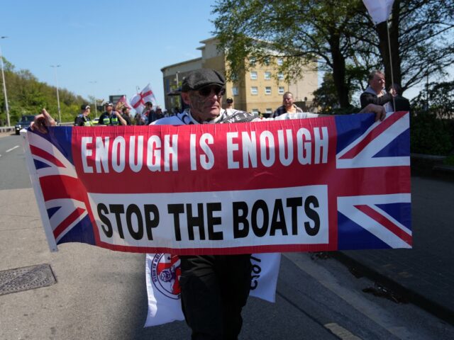gettyimages-2211672472-1-640x480-1 Protesters gather ahead of an anti-immigration protest march in Dover on the south-east co