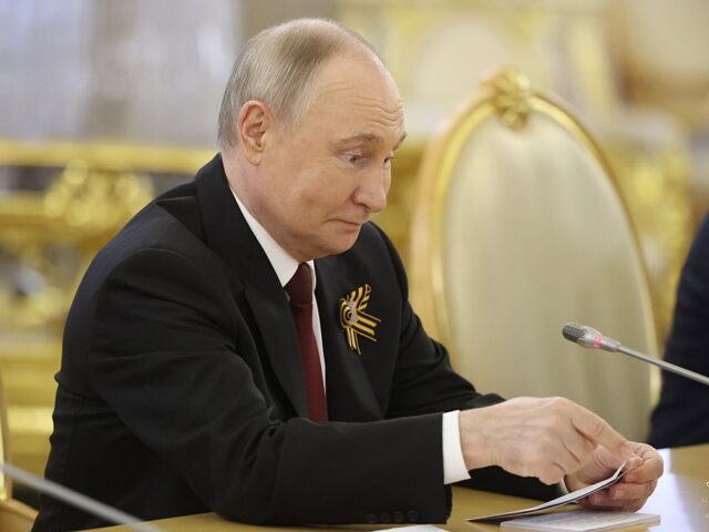 Russian President Vladimir Putin Holds Bilateral Meetings In Moscow MOSCOW, RUSSIA - MAY 9 (RUSSIA OUT) Russian President Vladimir Putin grimases during Russi