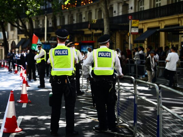 gettyimages-2213975192-1-640x480-1 LONDON, ENGLAND - MAY 11: Police officers are pictured as people take part in a protest ou