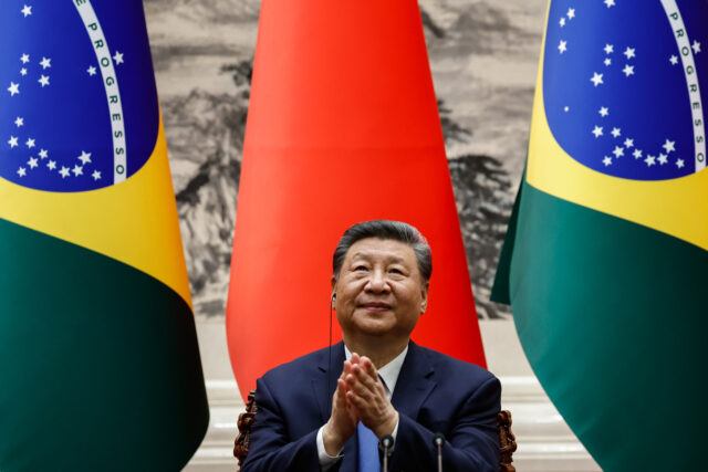 China-CELAC Forum BEIJING, CHINA - MAY 13: Chinese President Xi Jinping applauds after a a joint press confe