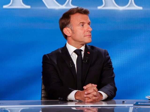 gettyimages-2214314564-1-640x480-1 France's President Emmanuel Macron looks on on the set during his guest appearance on a sp