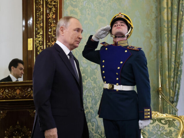 Putin Meets Malaysian Prime Minister Anwar Ibrahim In Moscow MOSCOW, RUSSIA - MAY 14 (RUSSIA OUT) Russian President Vladimir Putin enters the hall duri