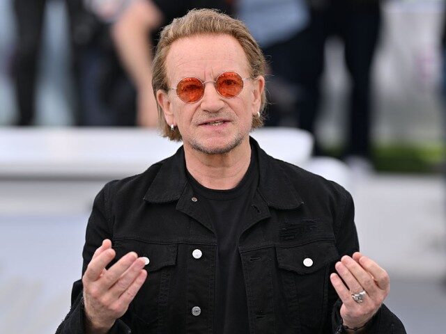 GettyImages-2214947161 Irish singer of U2 Bono poses during a photocall for the film 'Bono: Stories of Surrender'