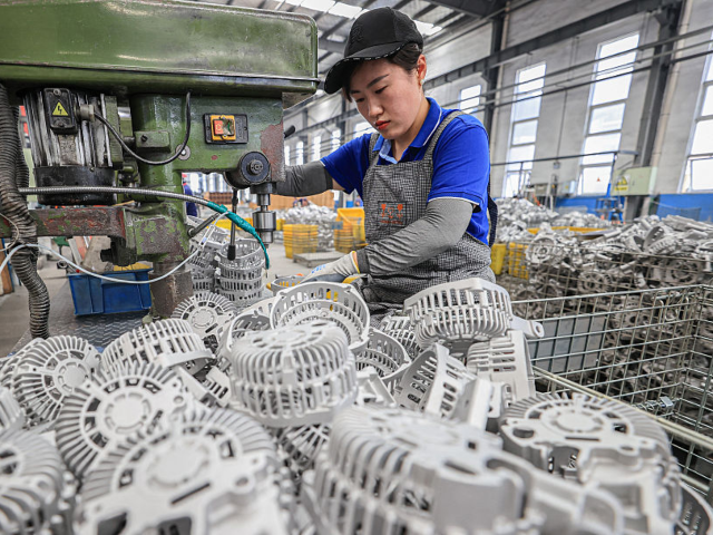 GettyImages-2215475087 An employee works at a factory that produces car parts for export in Lianyungang, in easte