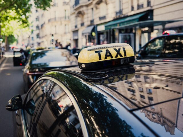 gettyimages-2215820974-1-640x480-1 A taxicab vehicle at a a taxicab rally on Boulevard Raspail to demonstrate against propose