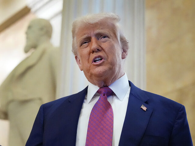GettyImages-2216074866 WASHINGTON, DC - MAY 20: President Donald Trump arrives with Speaker of the House Mike Joh
