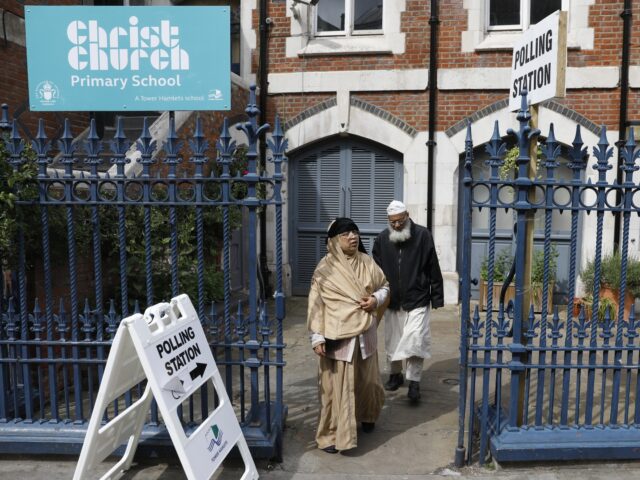 gettyimages-693689770-1-640x480-1 People are pictured outside a polling station on Brick Lane, east London on June 8, 2017,