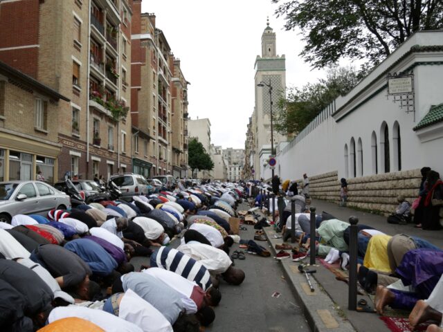 gettyimages-800697098-1-640x480-1 Muslims offer Eid al-Fitr prayers outside the Grande Mosquee de Paris (Great Mosque of Par