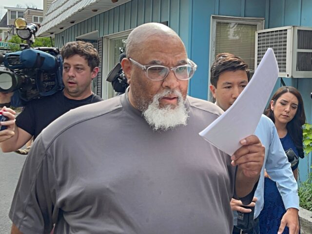 grim reaper Concord, NH - June 14: Former Harvard Medical School morgue manager Cedric Lodge, 55, shie