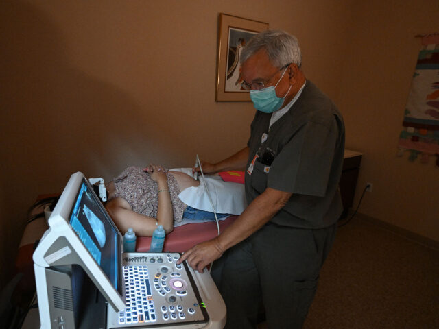 Heartbeat Bill Dr Franz Theard performs a sonogram to confirm pregnancy on a patient seeking abortion ser