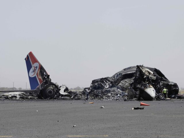 Houthi airport Sanaa (Osamah Abdulrahman / Associated Press) Yemenis inspect wreckage of a destroyed civilian aircraft following Israeli airstrikes on