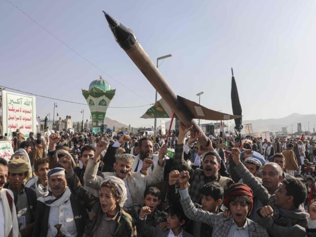 Houthi missile parade (Osamah Abdulrahman / Associated Press) Houthi supporters carry a mock rocket and chant slogans during an anti-Israel rally in San
