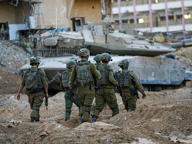 Israeli soldiers are seen during a ground operation in the Gaza Strip, Wednesday, Nov. 8, 2023. Israeli ground forces entered the Gaza Strip as they press ahead with their war against Hamas militants in retaliation for the group's unprecedented Oct. 7 attack on Israel. (AP Photo/Ohad Zwigenberg) gaza tactics