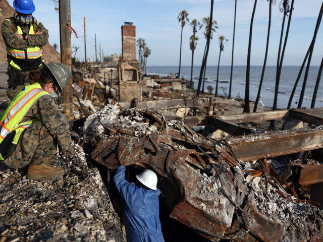 L.A. Fire Cleanup U.S. Marines with the 1st Marine Logistics Group work to remove hazardous waste from a veh