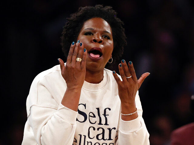 lesliejones NEW YORK, NEW YORK - MARCH 20: Comedian Leslie Jones and Film Director Spike Lee react dur