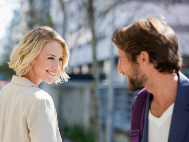 Man and Woman Smiling (Photo by ONOKY - Fabrice LEROUGE/Getty Stock Image)