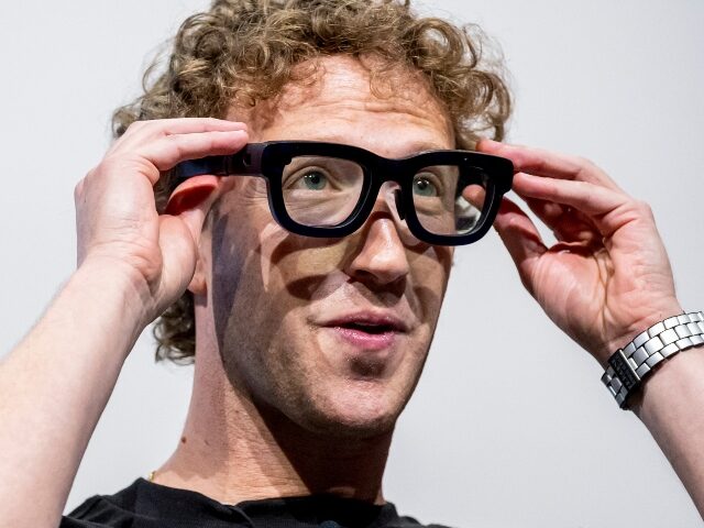 mark-zuckerberg-adjusts-his-dorky-glasses-640x480-1 Mark Zuckerberg adjusts his dorky glasses