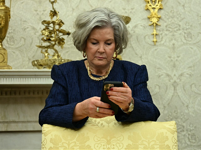 May8-25-White-House-Chief-of-Staff-Susie-Wiles-phone-getty White House Chief of Staff Susie Wiles looks at her phone as US President Donald Trump mak
