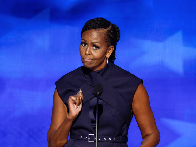 Michelle Obama Former first lady Michelle Obama speaks on stage during the second day of the Democratic N
