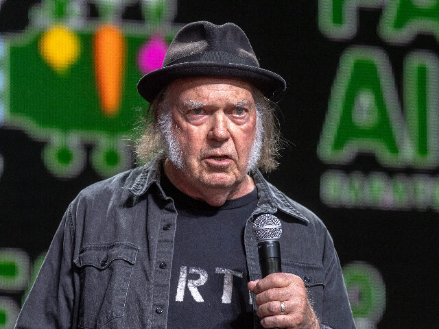 NeilYoung SARATOGA SPRINGS, NEW YORK - SEPTEMBER 21: Neil Young on stage during Farm Aid 2024 at Sar