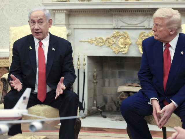 Netanyahu and Trump (Pool via Associated Press) President Donald Trump, right, listens as Israel's Prime Minister Benjamin Netanyahu