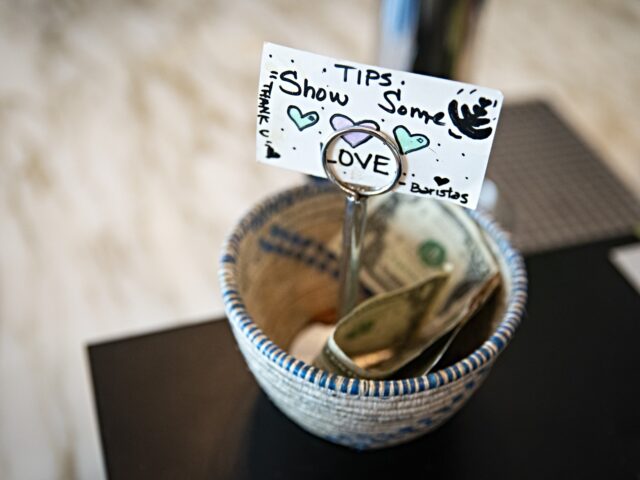 No Tax on Tips A tip jar at a coffee shop in the Union Market district in Washington, DC, US, on Friday,