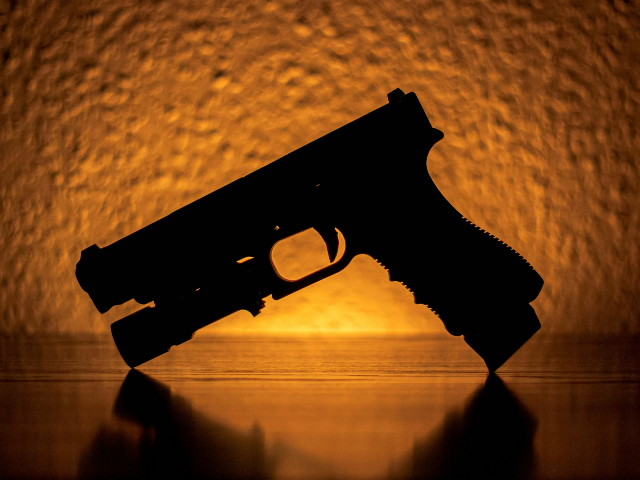pexels-csiktor-7075303 silhouette of a pistol