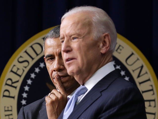 ppi-spc-getty WASHINGTON, DC - DECEMBER 13: U.S. President Barack Obama (L) listens to Vice President Jo