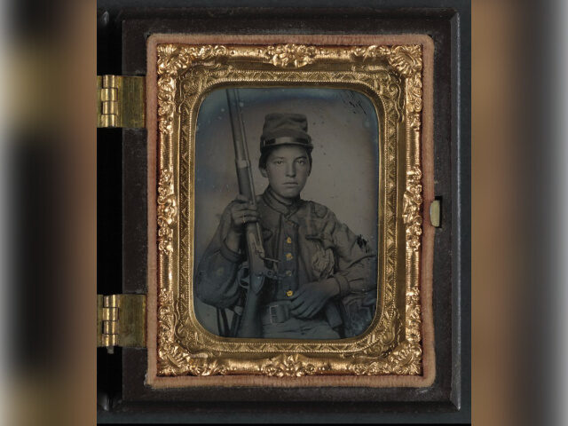 Sergeant William T. Biedler, 16 years old, of Company C, Mosby's Virginia Cavalry Regiment, with a musket. Sergeant William T. Biedler, 16 years old, of Company C, Mosby's Virginia Cavalry Reg