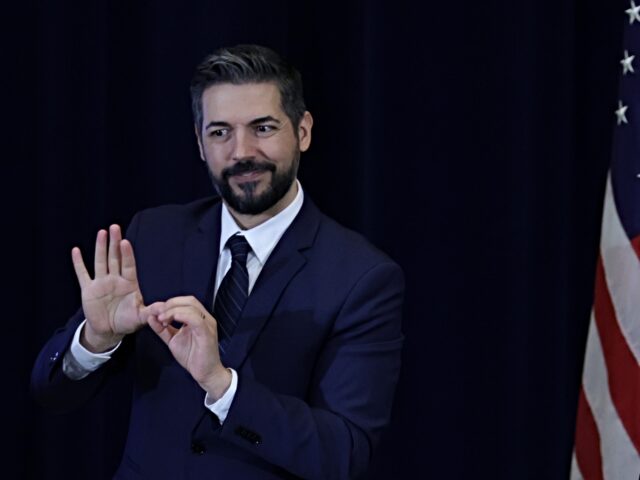 sign language translator WASHINGTON, DC - MARCH 28: With the help of a sign language interpreter, U.S. Secretary of