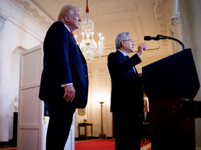 Trump and Nvidia CEO U.S. President Donald Trump (L) listens as Nvidia CEO Jensen Huang speaks in the Cross Hal