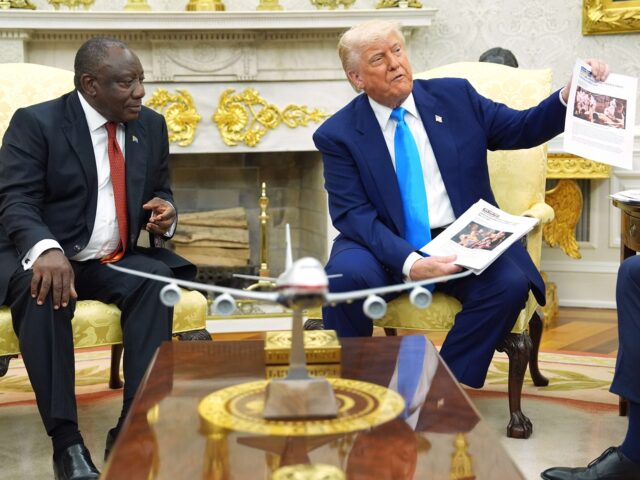 Trump Congo (Evan Vucci / Associated Press) President Donald Trump shows documents as he meets South Africa's President Cyril Ram